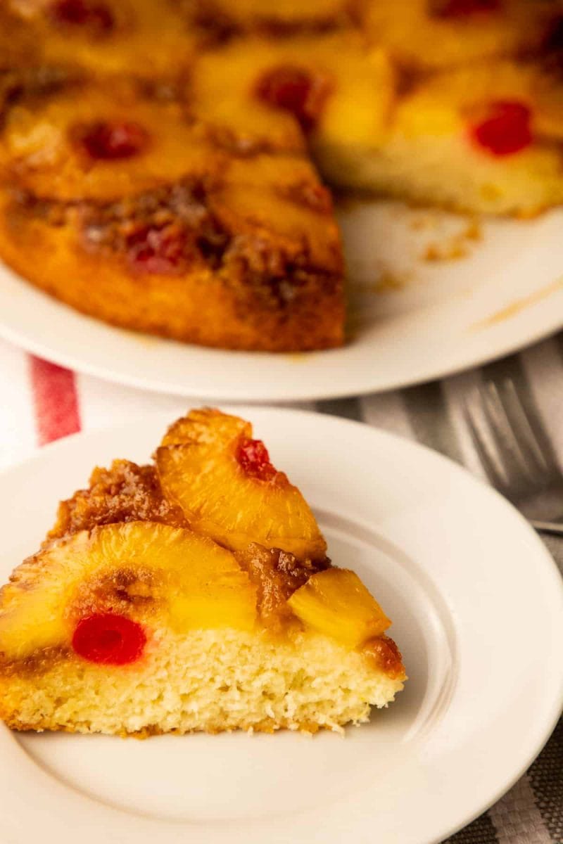 Pineapple Upside-Down Cake on white round plate
