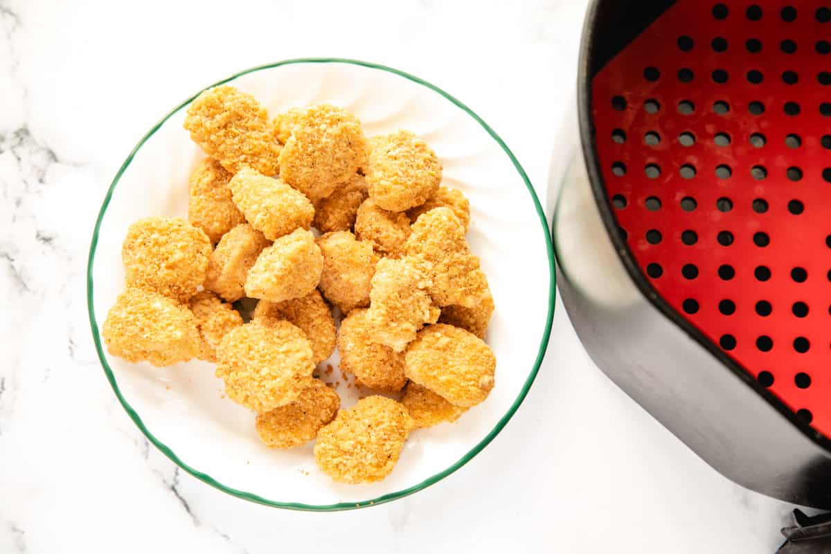 chicken nuggets with air fryer basket.