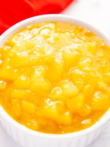 mango compote on a small white bowl.