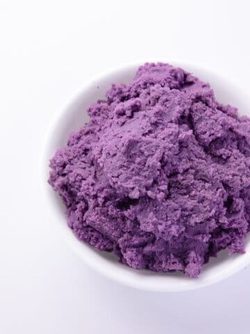 cooked purple yam on white bowl.